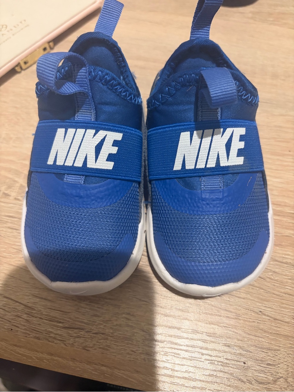 Nike Baby Slip-On Sneakers in Bright Blue with White Logo